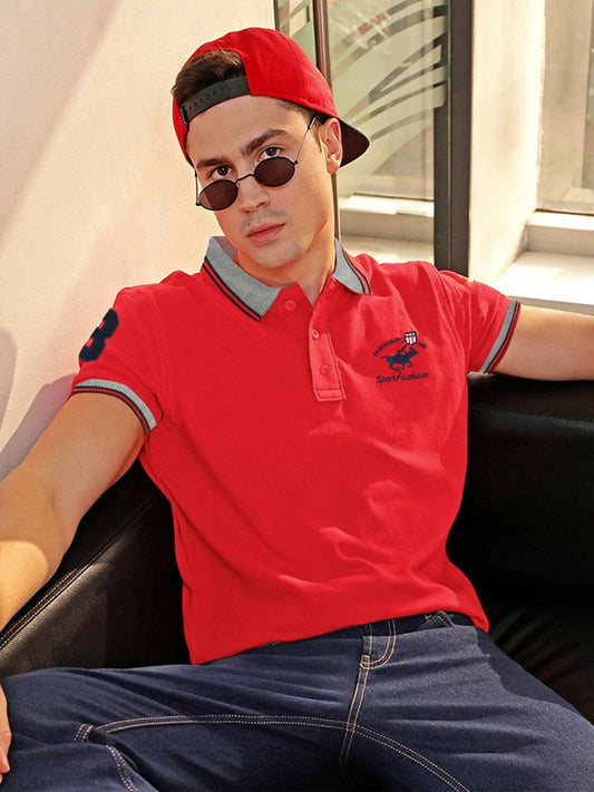 A stylish Jupiter men's polo shirt with jacquard knit collar and cuffs, embroidered front logo, appliqué digit 3 on the arm, side vents, and a clean button placket – designed for casual comfort.
