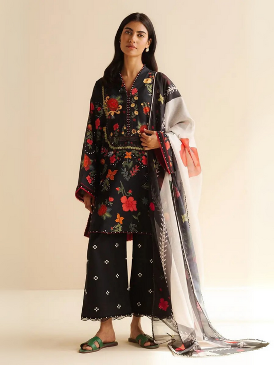 Unstitched 3-piece printed suit with embroidered lawn shirt, minimal cambric trouser, and soft blush-toned silk dupatta.
