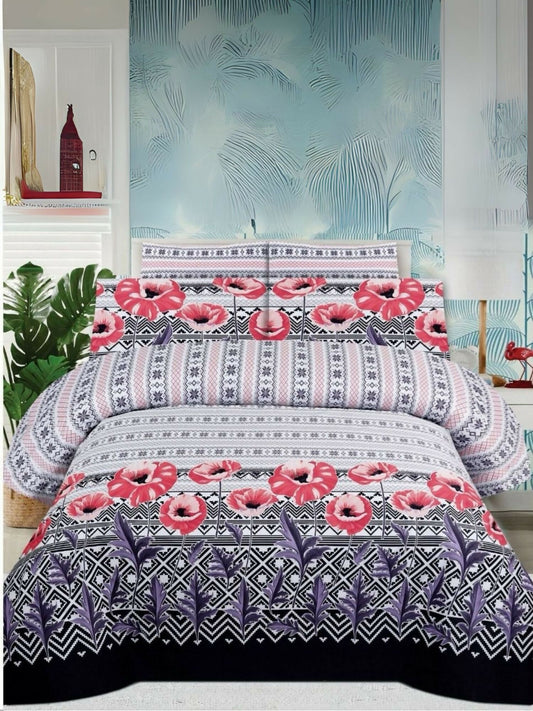 Danier 6pcs comforter set featuring a black and white base with pink floral design – includes comforter, bedsheet, and four pillow covers.