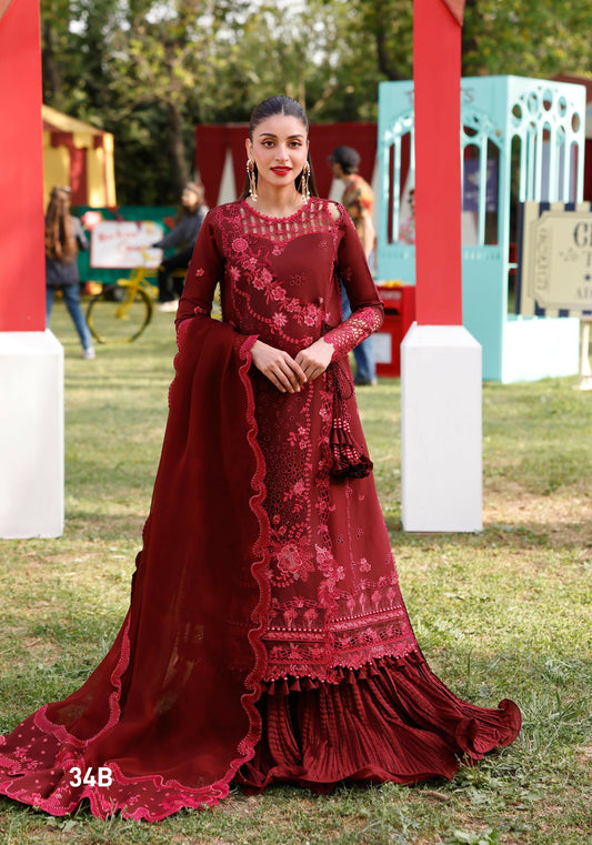 Girl standing wearing unstitched embroidered lawn suit with embroidery on front center, left, and right, featuring organza laces and motif, chiffon dupatta with embroidered pallos and side laces, paired with dyed cotton trouser.