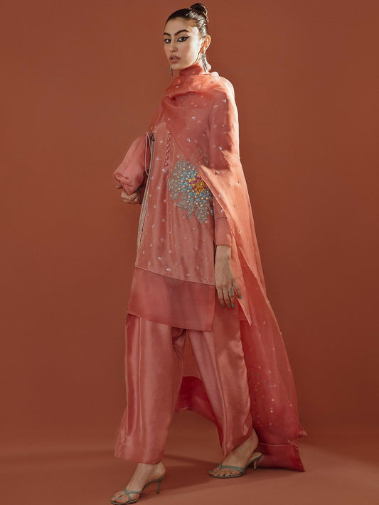 Sorbet pink silk outfit with Swarovski and pearl embellishments, shalwar, and hand-embellished organza dupatta by Hussain Rehar.