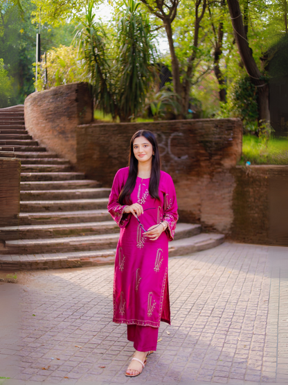 Stitched 2-piece suit with heavily embroidered summer lilen shirt and plain trouser from Tehzeeb Libas.