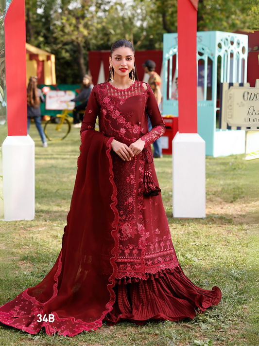 Girl standing wearing unstitched embroidered lawn suit with embroidery on front center, left, and right, featuring organza laces and motif, chiffon dupatta with embroidered pallos and side laces, paired with dyed cotton trouser.