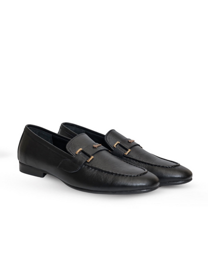 Black cow leather shoes with a smooth, polished finish and classic design, built for comfort and versatile style.