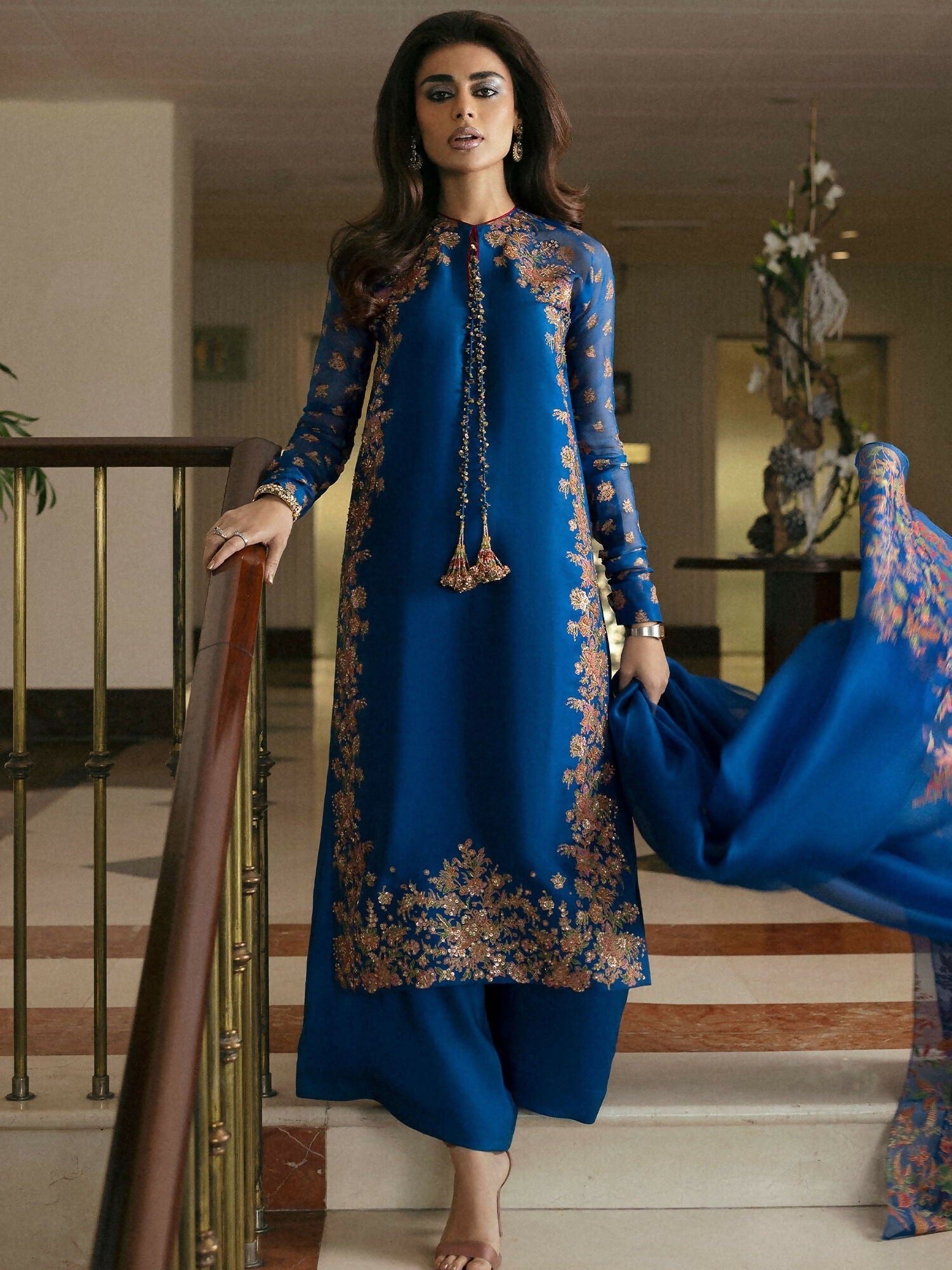 Teal blue raw silk 2-piece suit with embellished screen-printed shirt, raglan organza sleeves, plain culottes, and screen-printed dupatta – Hussain Rehar.