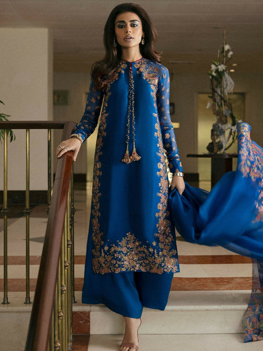 Teal blue raw silk 2-piece suit with embellished screen-printed shirt, raglan organza sleeves, plain culottes, and screen-printed dupatta – Hussain Rehar.