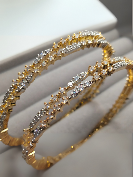 H&A Jewellery silver rhodium-plated kangina bangles with semi-precious stones.