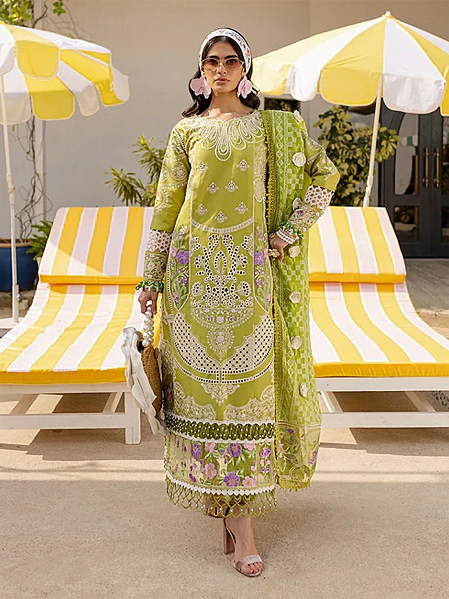 Unstitched 3-piece suit with embroidered lawn front and sleeves, embroidered front and back necklines, monark dupatta with organza pallu, and dyed cambric trouser, perfect for festive and graceful wear.