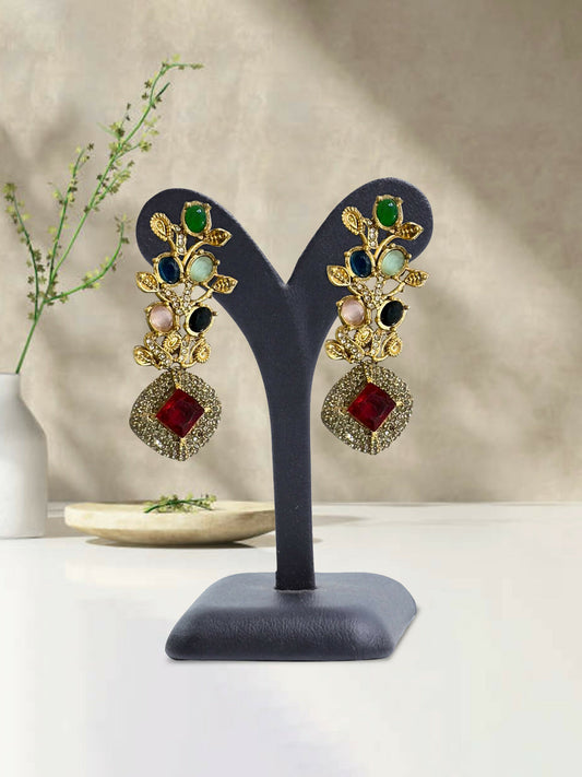 Glitter Jewellery gold leaf motif drop earrings with multicolored stones and square ruby red crystal drop