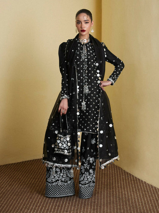 Hussain Rehar Jet Black 3-piece raw silk short shirt with 3D floral hand embellishments, embroidered farshi shalwar, and organza dupatta.