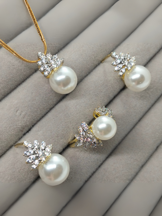 H&A Jewellery pearl and crystal 3-piece set with necklace, stud earrings, and matching ring in gold finish.
